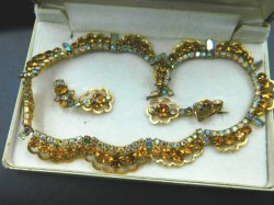 anc amber rhinestone set in box